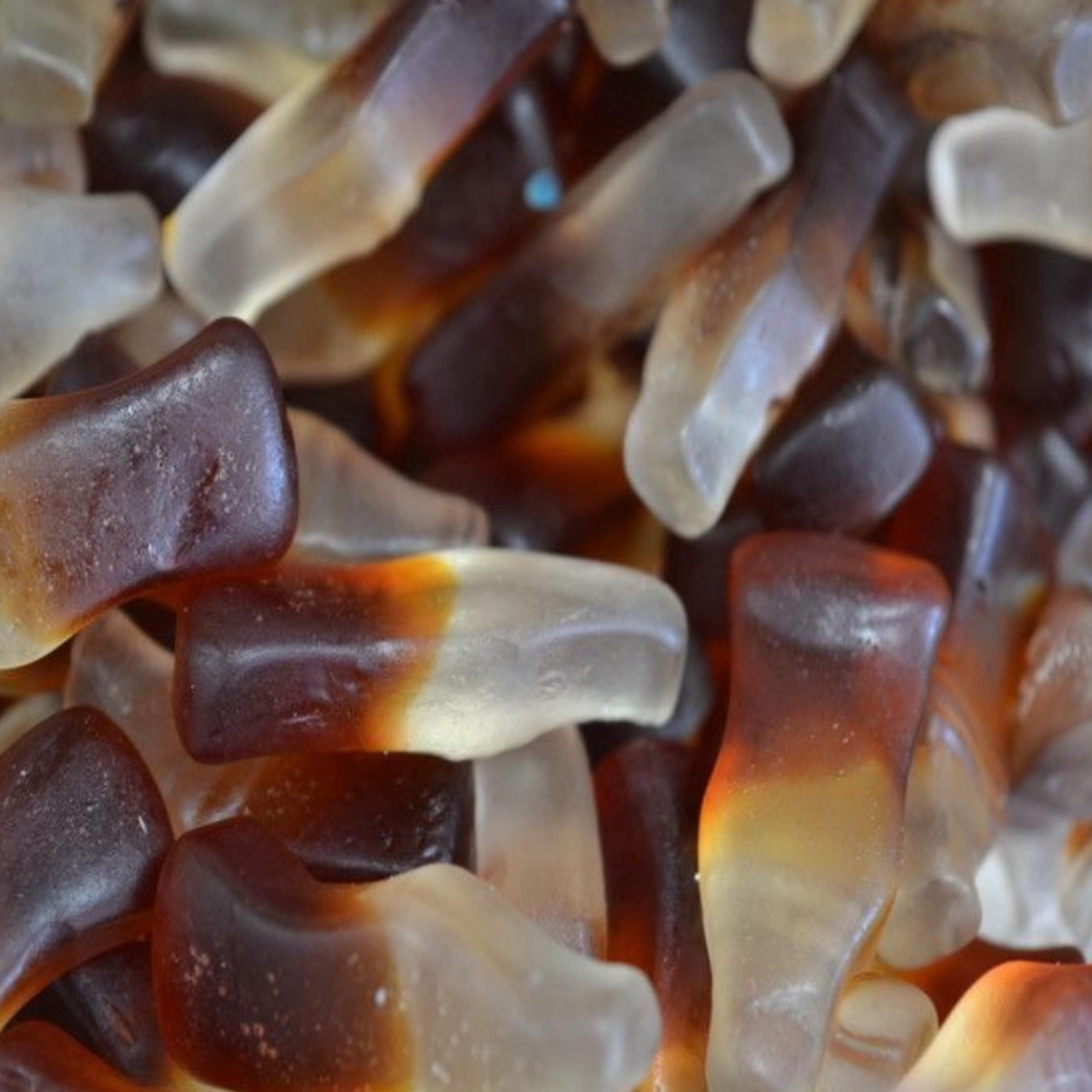 Image de Bouteilles Cola, une friandise savoureuse disponible sur Friandises Magic.