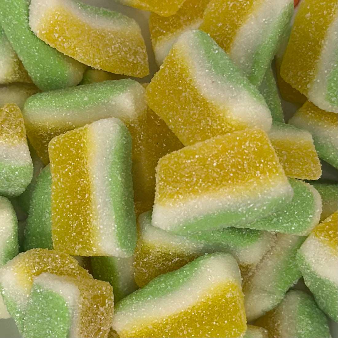 Image de Tranches Piña Colada Sucrées, une friandise savoureuse disponible sur Friandises Magic.