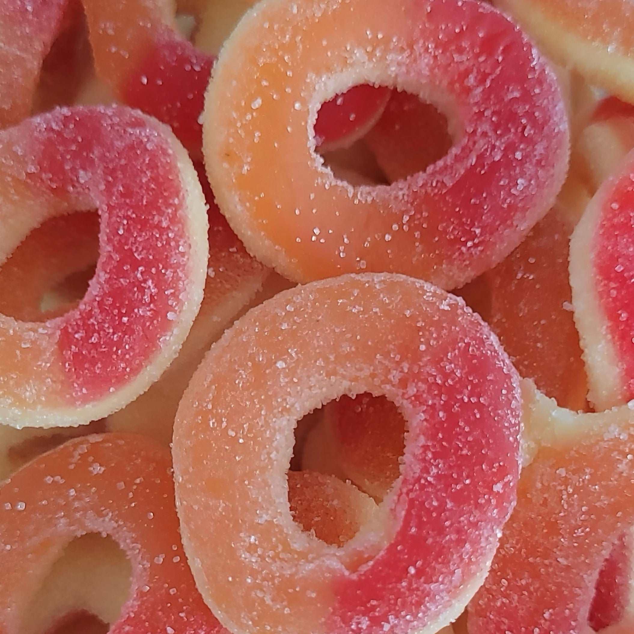 Image de Anneaux Pêche Sucré, une friandise savoureuse disponible sur Friandises Magic.